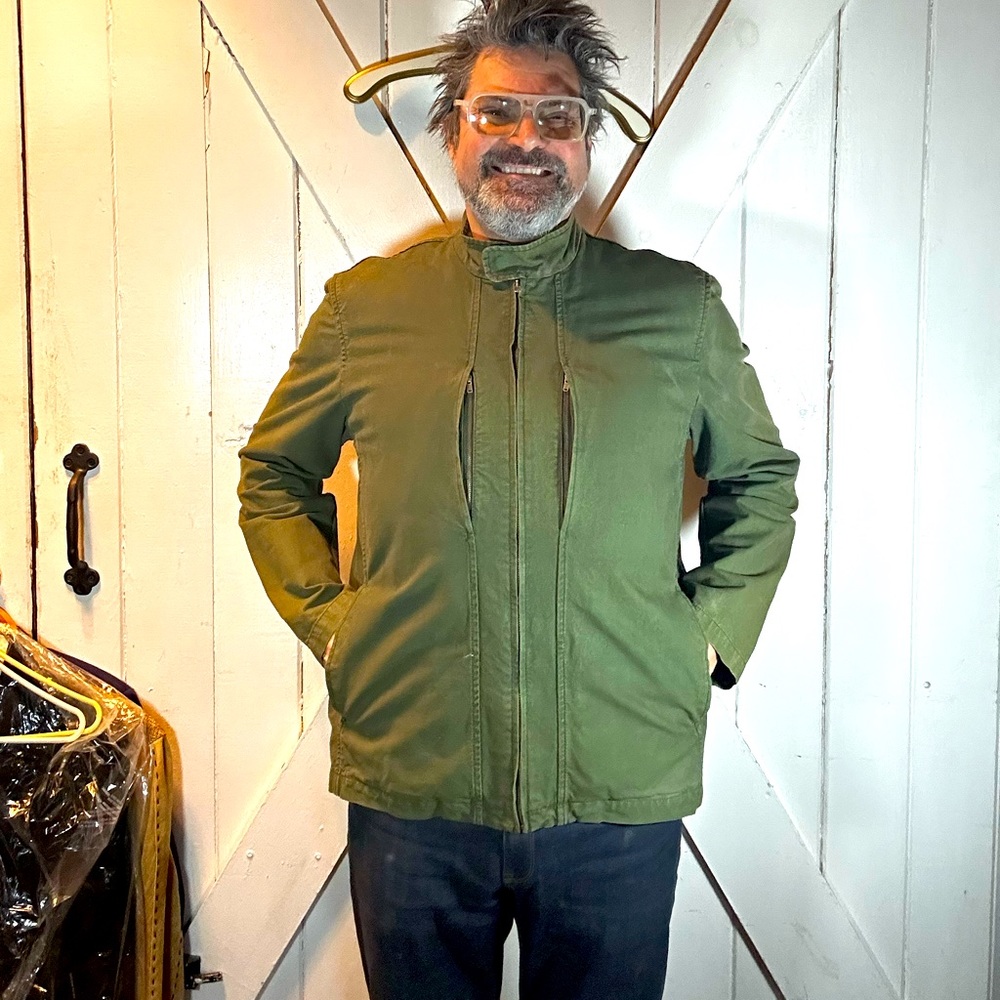 Four pockets, military green denim jacket inside zip out vest like new